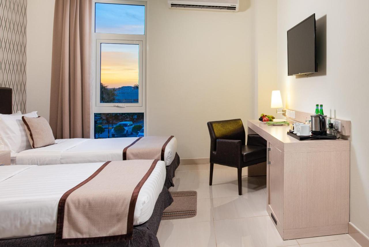 City Hotel Дукм Экстерьер фото
